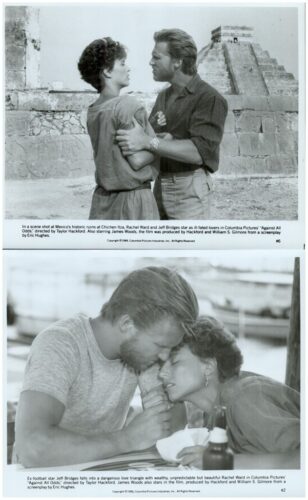 Man and woman embrace, facing each other, with ancient ruins behind—a still from the film Against All Odds beyond a Mayan site.