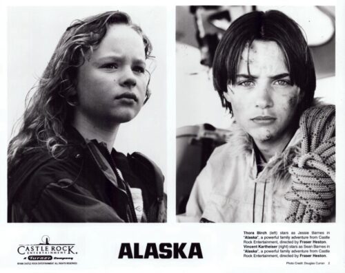 Split black-and-white poster for Alaska, featuring Thora Birch on the left and a second character on the right, with the film title at the bottom.