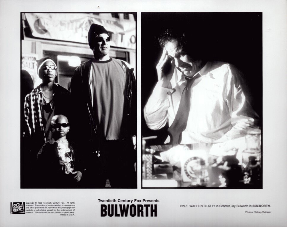 Two-panel black-and-white Bulworth movie poster: left panel shows a group of three people; right panel shows a man in a shirt and tie talking on the phone, with the Bulworth title and credits beneath.