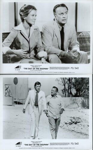 Two black-and-white film stills from The Day of the Dolphin: a suited man and woman sit on a couch, looking thoughtful (top). Two men in light suits walk outdoors (bottom).