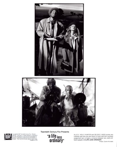 Composite black-and-white movie poster: top scene shows a man and woman in trench coats looking upward; bottom scene features two people with gear inside a tent, with the film title 'A Life Less Ordinary'.