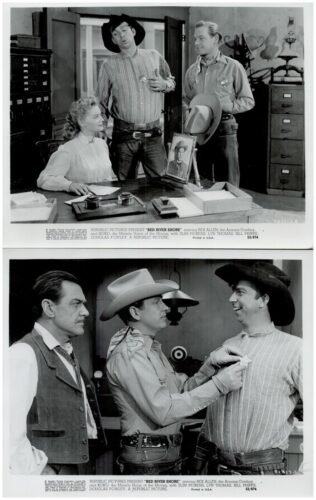 Two men in Western shirts and hats stand with a seated woman at a desk in a film studio, a framed photo and office supplies on the desk behind them (top panel).