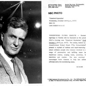 Black-and-white NBC publicity photo of a man in a suit, next to a typed NBC press release about Unsolved Mysteries and UFO sightings.