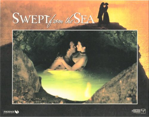 Movie poster for Swept from the Sea, showing a couple kissing in a rocky sea cave with a sunset silhouette above them.