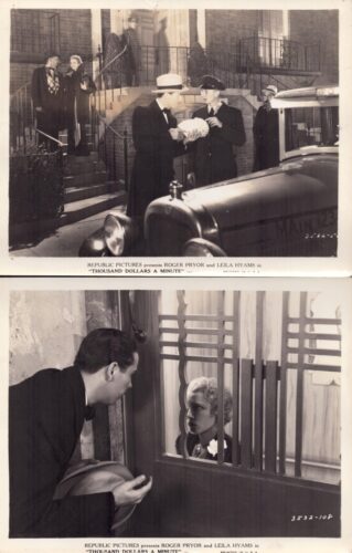Movie still: two men in formal hats with a stack of money beside a vintage car, outside steps of a building while bystanders watch.