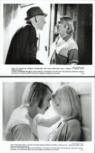 Two black-and-white film stills: top frame shows a man in a hat leaning toward another man at a doorway; bottom frame shows a man and a woman in a close conversation in a hallway.