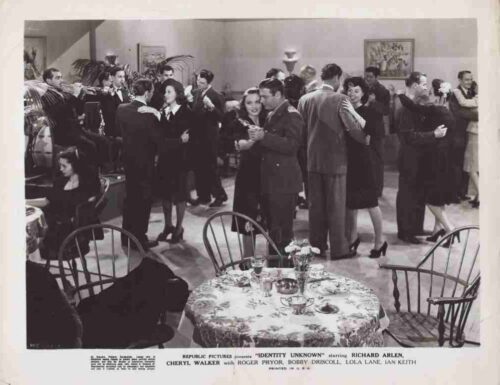 Crowded 1950s ballroom scene with couples dancing in the background and a musician playing on the left; a round table with a floral tablecloth and chairs in the foreground suggests a social gathering.
